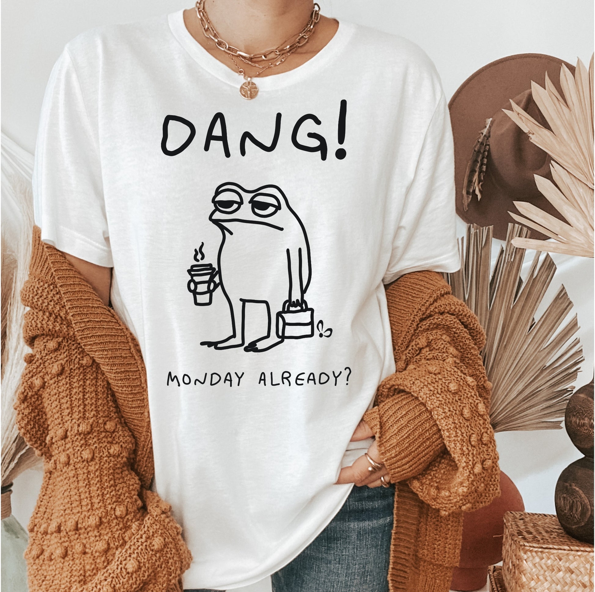 cotton tshirt printed with unimpressed frog illustration and monday meme