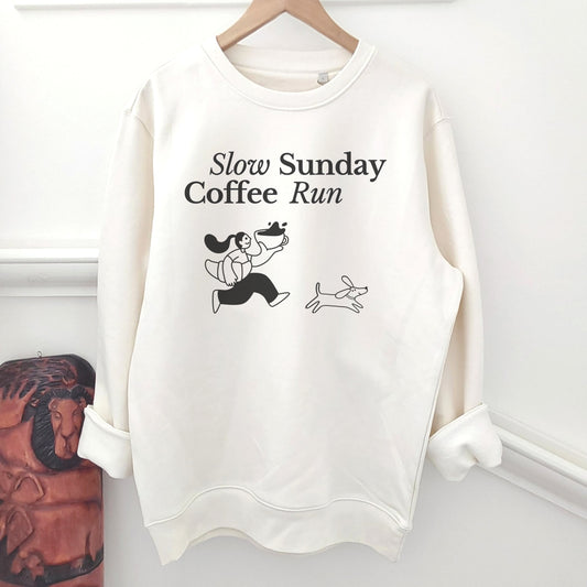White sweatshirt with 'Slow Sunday Coffee Run' text and graphics on a white background