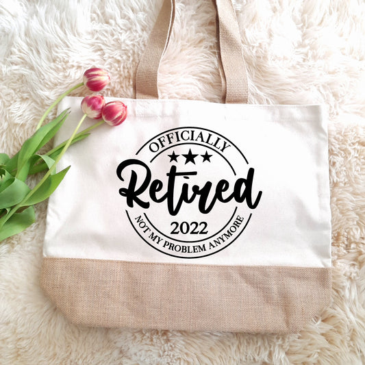 officially retired tote bag